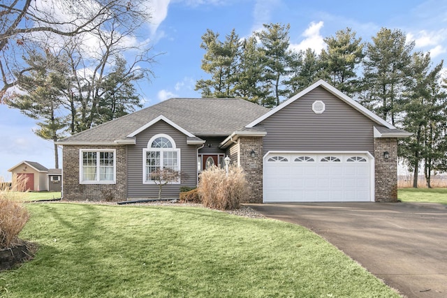 single story home with a garage and a front lawn