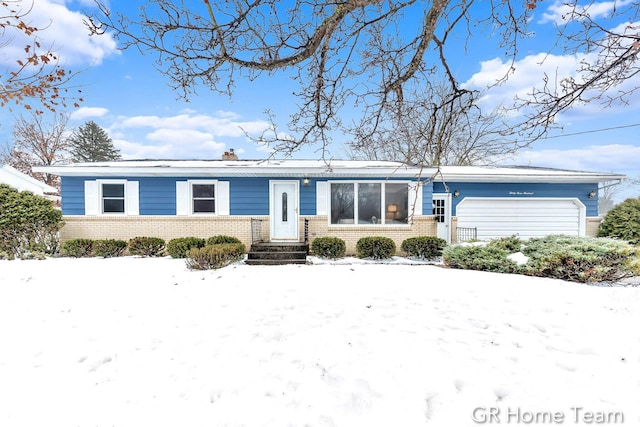 single story home with a garage