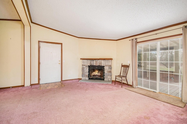 unfurnished living room featuring carpet floors, ornamental molding, and a textured ceiling