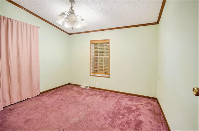 carpeted spare room with lofted ceiling, ornamental molding, a textured ceiling, and a notable chandelier