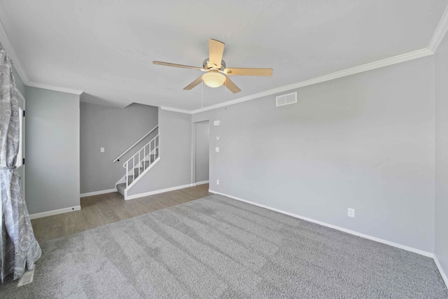 unfurnished room featuring ceiling fan, ornamental molding, and hardwood / wood-style floors