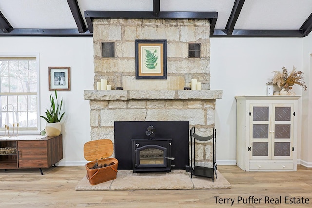 details with hardwood / wood-style floors and beamed ceiling