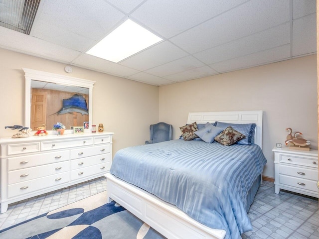 bedroom with a drop ceiling