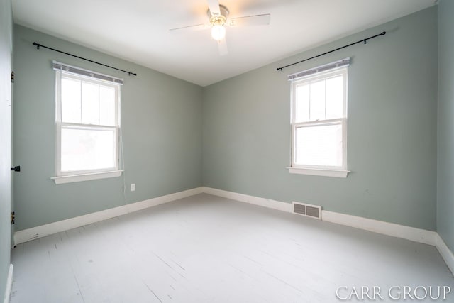 spare room featuring ceiling fan