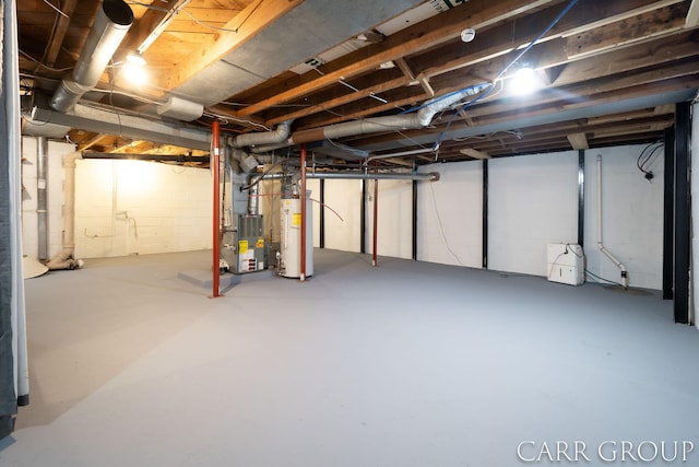 basement featuring heating unit and gas water heater