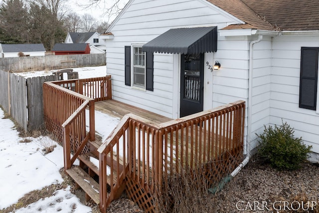 view of snow covered deck