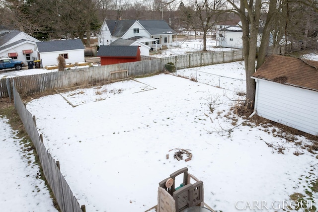 view of yard covered in snow