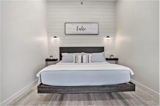 bedroom featuring hardwood / wood-style floors