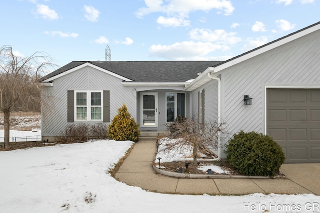 view of front of property featuring a garage