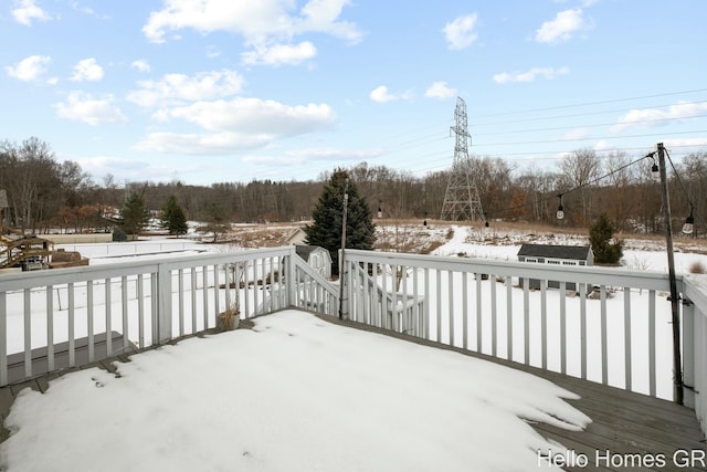 view of snow covered deck