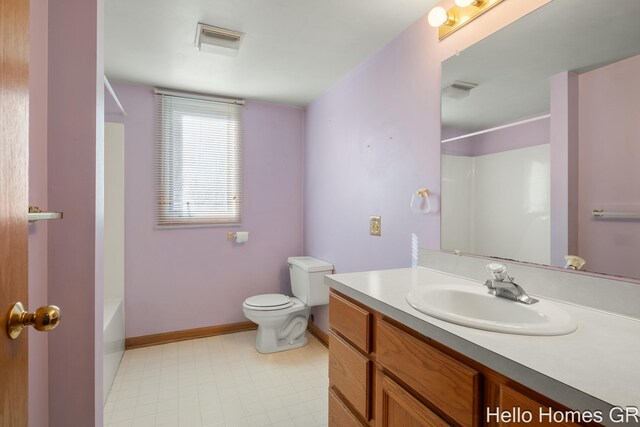 full bathroom with vanity, shower / bathing tub combination, and toilet