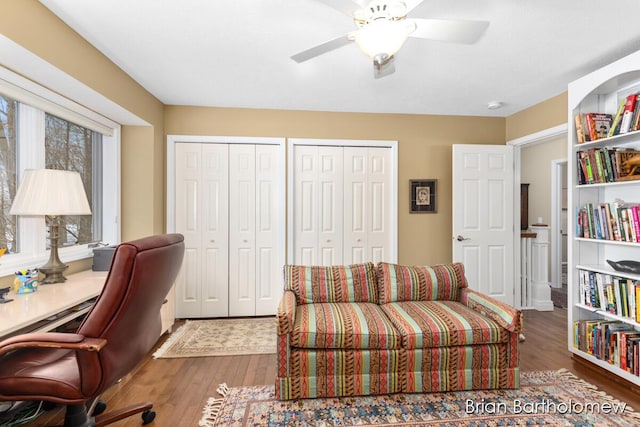 office space featuring hardwood / wood-style flooring and ceiling fan