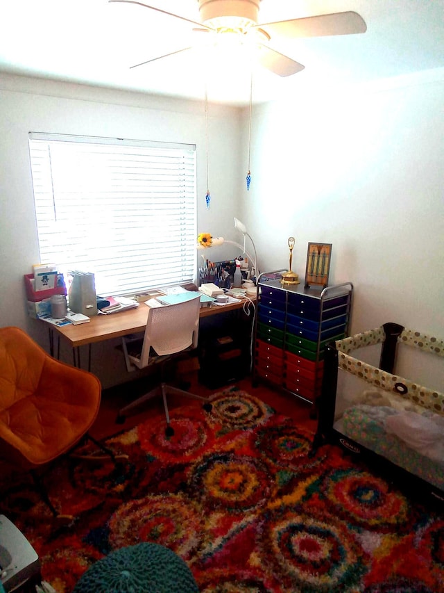 home office with ceiling fan and plenty of natural light