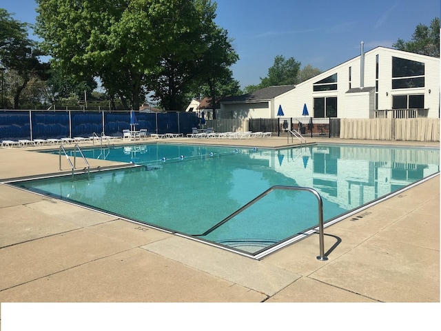 pool featuring fence