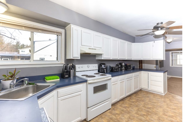 kitchen featuring white cabinetry, sink, white electric range oven, and ceiling fan