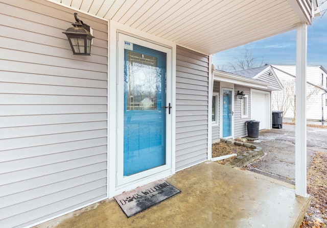 entrance to property with a garage