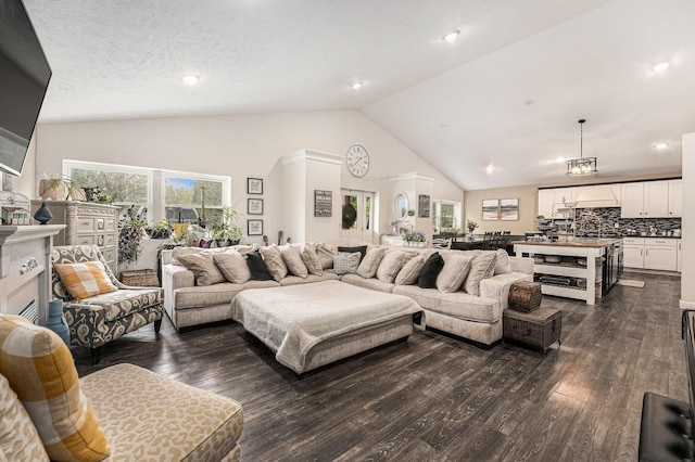 2678 Richmond St NW, Grand Rapids, MI 49504 - living room featuring dark wood-style flooring, high vaulted ceiling, and recessed lighting