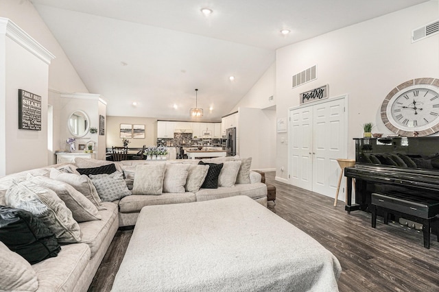 2678 Richmond St NW, Grand Rapids, MI 49504 - living area with high vaulted ceiling, dark wood-type flooring, recessed lighting, and visible vents