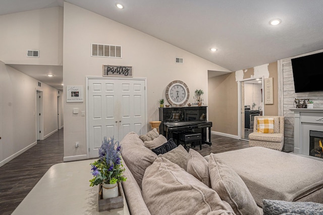 2678 Richmond St NW, Grand Rapids, MI 49504 - living room featuring baseboards, dark wood-style flooring, and visible vents
