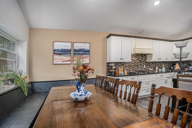 2678 Richmond St NW, Grand Rapids, MI 49504 - dining space with vaulted ceiling
