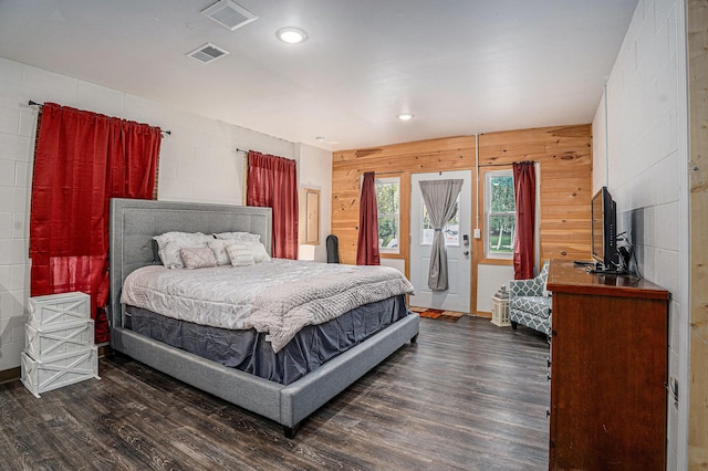 2678 Richmond St NW, Grand Rapids, MI 49504 - bedroom with visible vents, access to exterior, and dark wood-type flooring