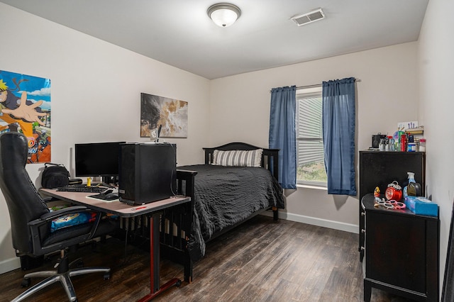2678 Richmond St NW, Grand Rapids, MI 49504 - bedroom with visible vents, baseboards, and wood finished floors