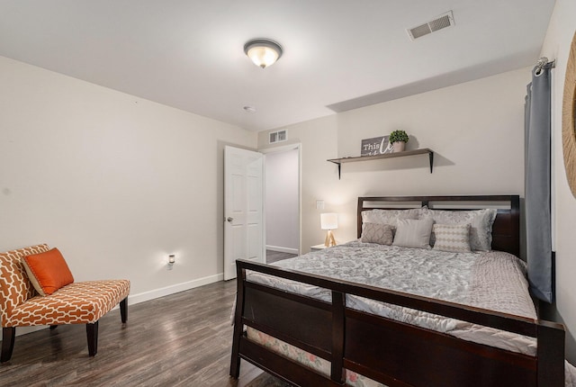2678 Richmond St NW, Grand Rapids, MI 49504 - bedroom featuring baseboards, visible vents, and dark wood finished floors