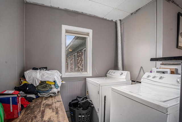 2678 Richmond St NW, Grand Rapids, MI 49504 - laundry room with laundry area, washing machine and dryer, and wood finished floors