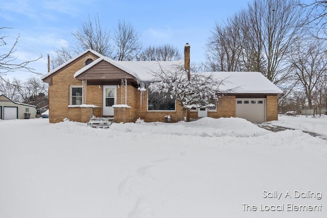 single story home featuring a garage