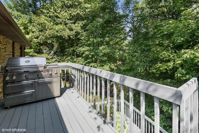 wooden deck with grilling area