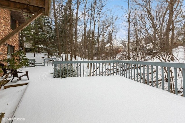 view of yard covered in snow