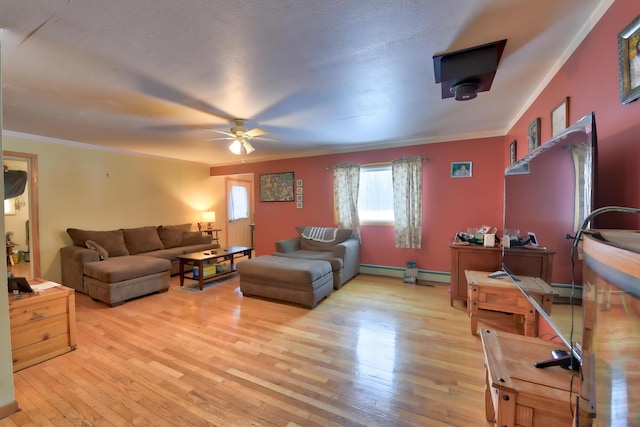 living room with crown molding, a baseboard radiator, ceiling fan, and light hardwood / wood-style flooring