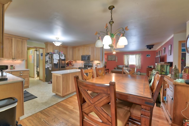 dining room featuring light hardwood / wood-style floors