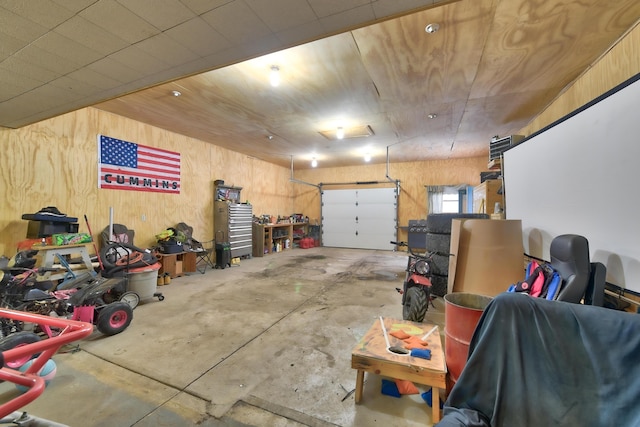 garage with wood walls