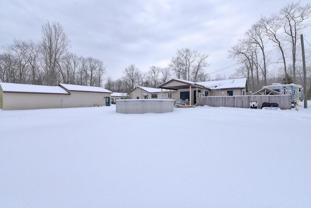 view of yard covered in snow