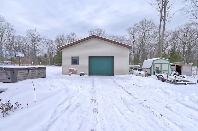 view of snow covered garage