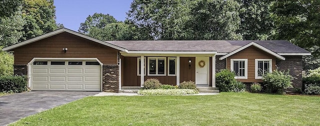 ranch-style house with a garage and a front yard