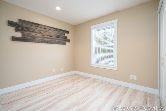 empty room featuring light wood-type flooring