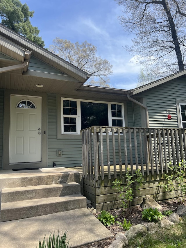 6474 Blackhawk Ln, Twin Lake, MI 49457 - doorway to property featuring a porch