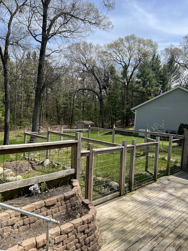 6474 Blackhawk Ln, Twin Lake, MI 49457 - deck with a storage unit and an outdoor structure