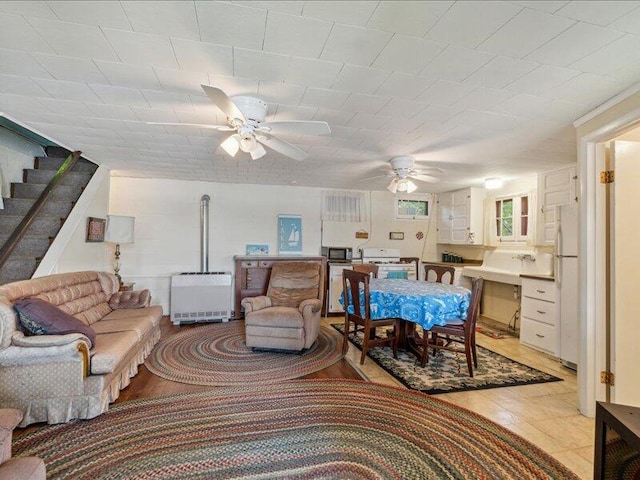 living room featuring ceiling fan