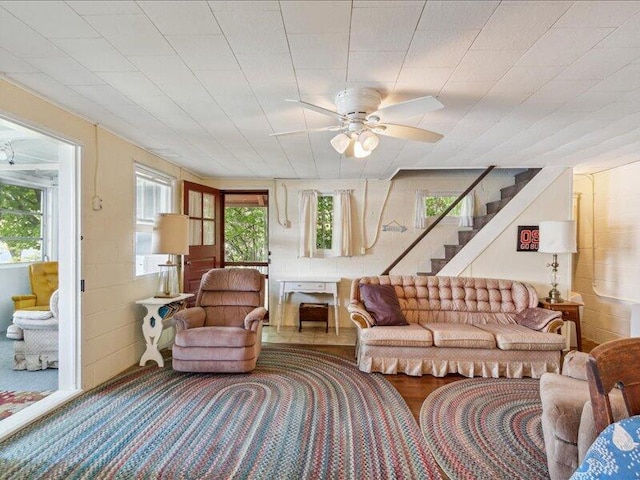 interior space featuring ceiling fan