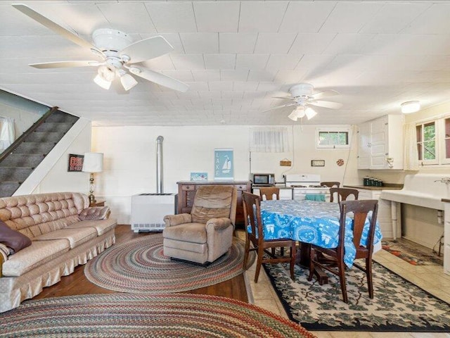 living room featuring ceiling fan