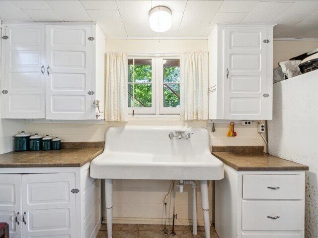 kitchen with white cabinetry