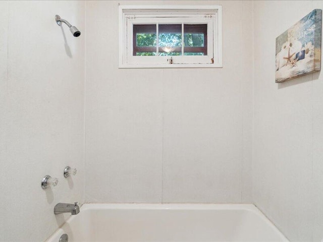 bathroom featuring bathing tub / shower combination