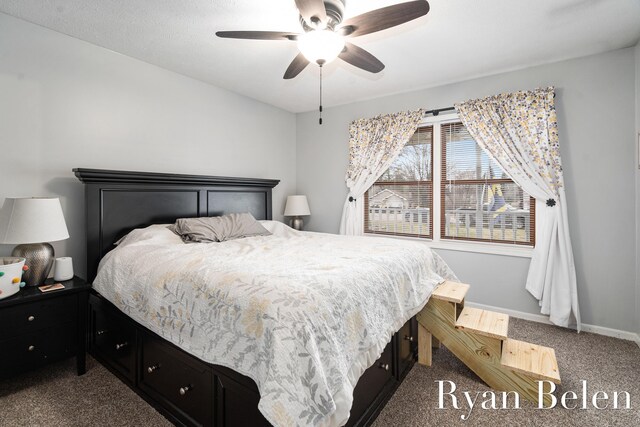 carpeted bedroom with ceiling fan