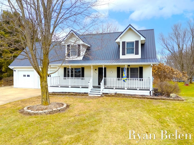 new england style home featuring a porch, a garage, and a front lawn