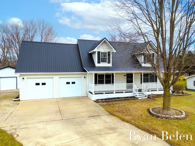 cape cod-style house with a front yard and covered porch