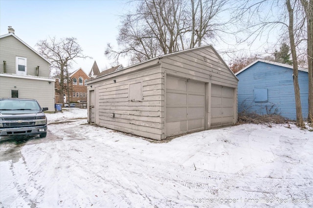 view of snow covered garage