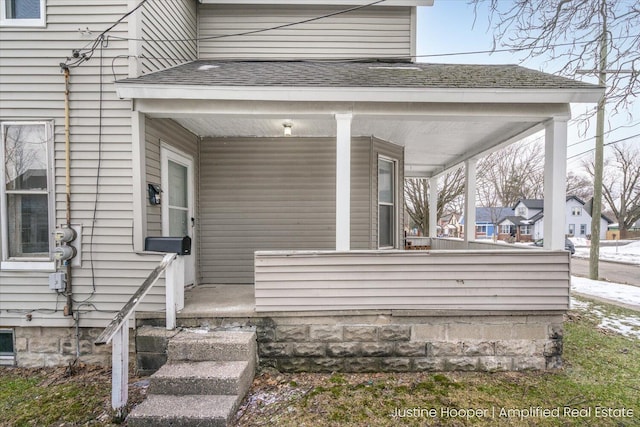 entrance to property with a porch